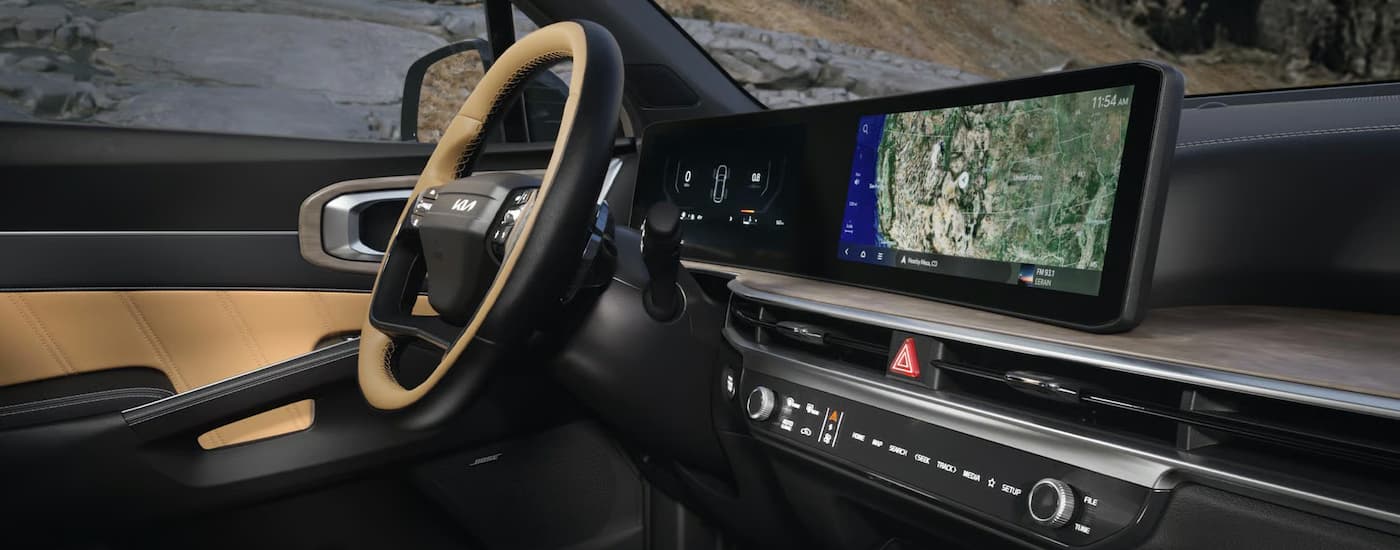 Steering wheel and infotainment screen in a 2026 Kia Sorento
